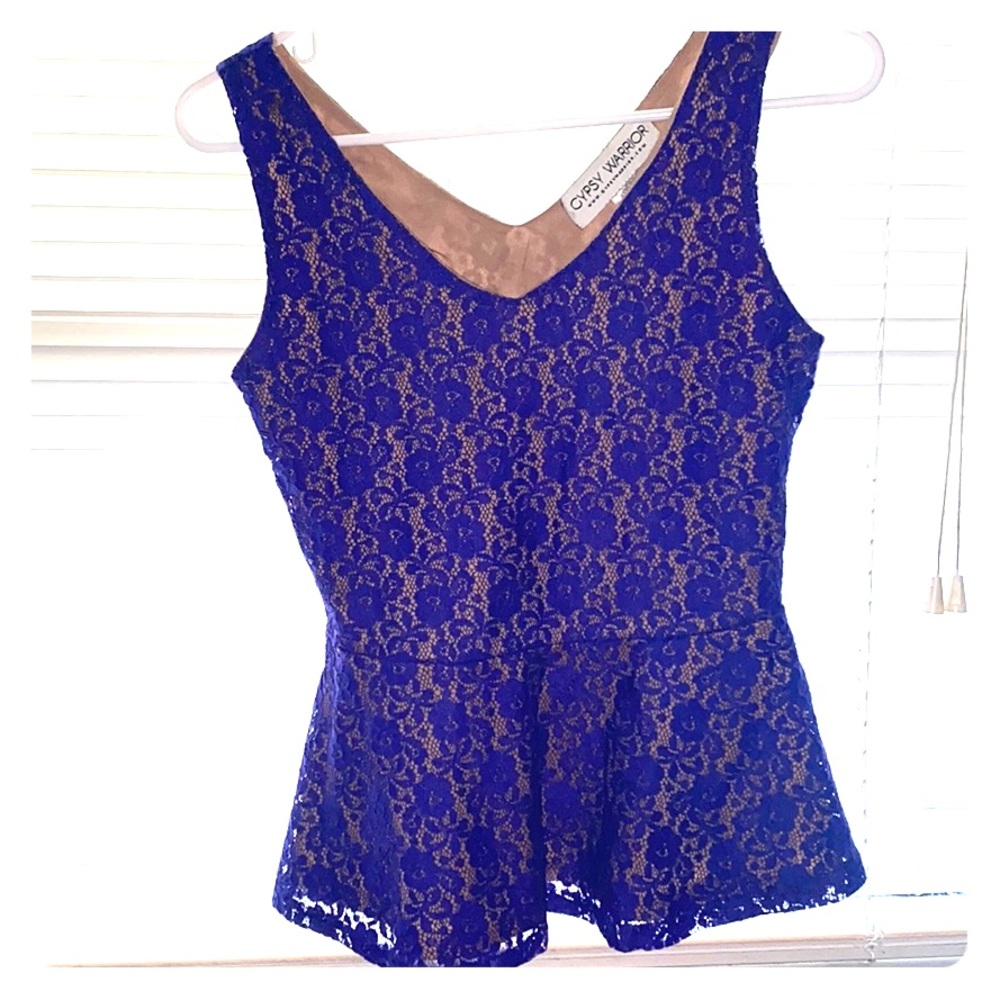 Lacey peplum blouse non see through.zipperon side.